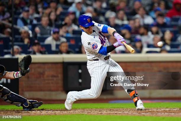 Harrison Bader of the New York Mets hits a RBI double in the eighth inning of the game between the Pittsburgh Pirates and the New York Mets at Citi...