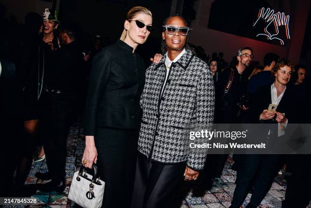 Rosamund Pike and Mickalene Thomas at Dior Pre-Fall 2024 Show held at the Brooklyn Museum on April 15, 2024 in New York, New York.