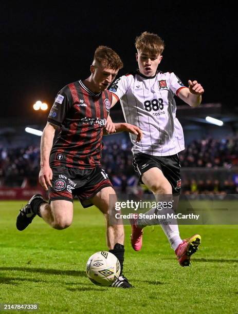 Dublin , Ireland - 15 April 2024; James McManus of Bohemians in action against Eoin Kenny of Dundalk during the SSE Airtricity Men's Premier Division...