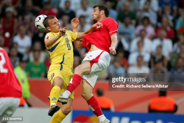 June 26: Oleg Gusev of Ukraine and Alexander Frei of Switzerland challenge during the FIFA World Cup Finals 2006 Round Of 16 match between...