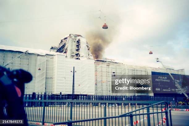 Smoke from a fire at Borsen, Denmark's old stock exchange building, in Copenhagen, Denmark, on Tuesday, April 16, 2024. The fire has torn down the...