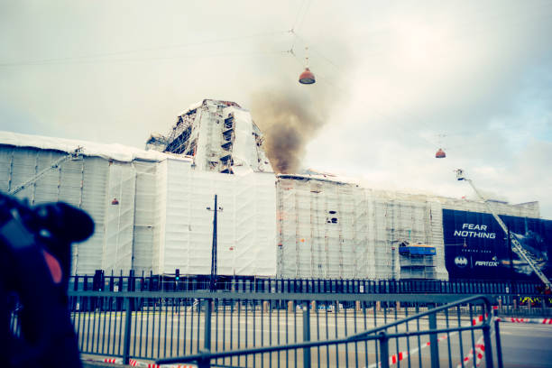 DNK: Fire Engulfs Copenhagen Landmark Old Stock Exchange Building