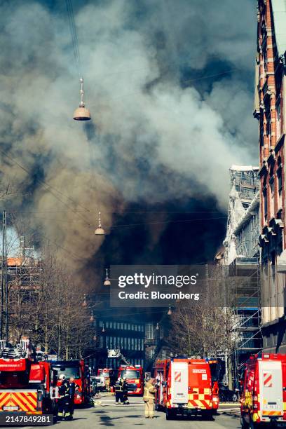 Smoke coming from a fire at Borsen, Denmark's old stock exchange building, in Copenhagen, Denmark, on Tuesday, April 16, 2024. The fire has torn down...