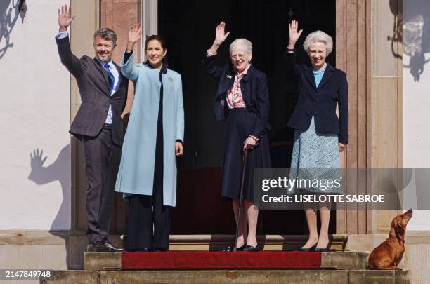 Queen Margrethe II together with Denmark's Princess Benedikte , Queen Mary of Denmark and King Frederik X of Denmark wave to onlookers at Fredensborg...