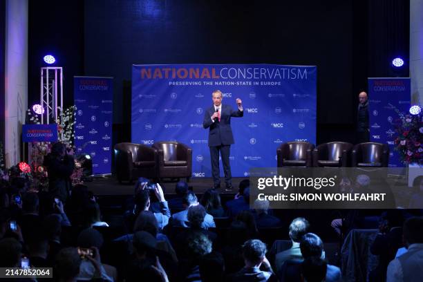 British eurosceptic populist Nigel Farage speaks during the "NatCon" national conservatism conference gathering hard-right politicians at the...