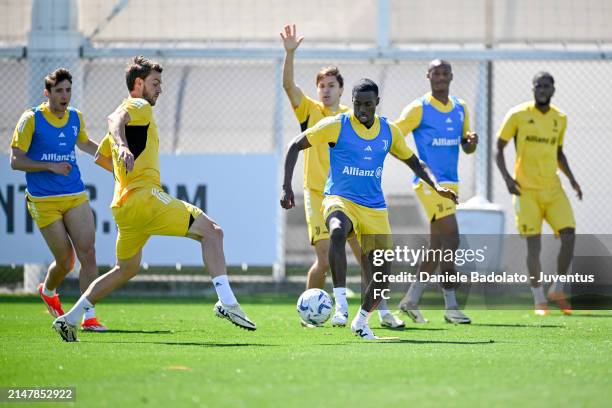 Daniele Rugani, Timothy Weah of Juventus during a training session at JTC on April 16, 2024 in Turin, Italy.