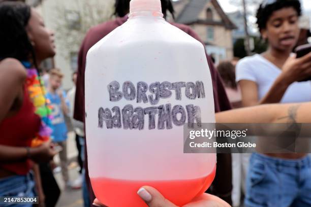 Boston, MA A student who was celebrating with the dance crowd at Ashford and Pratt streets, said this jug contained "a lot of alcohol." A few blocks...