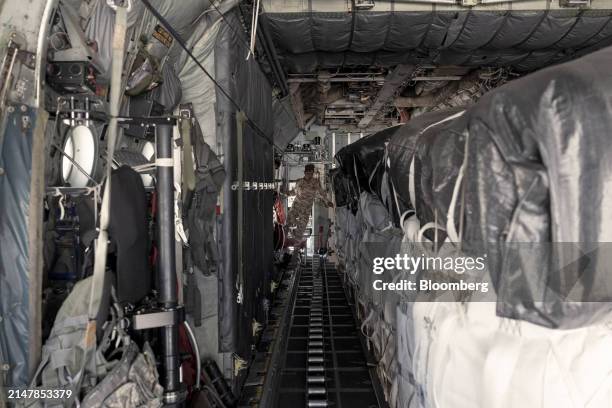 Member of the aircrew aboard a Jordanian Air Force C-130 during a humanitarian aid drop over the northern Gaza Strip, on Monday, April 15, 2024....