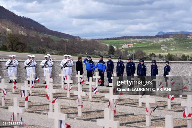 France's President Emmanuel Macron reviews French gendarmes and cadets during an unprecedented tribute ceremony for the Vercors resistance fighters...