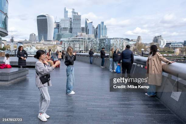 People taking pictures of themselves or one another with the City of London skyline as the backdrop on 6th March 2024 in London, United Kingdom. The...