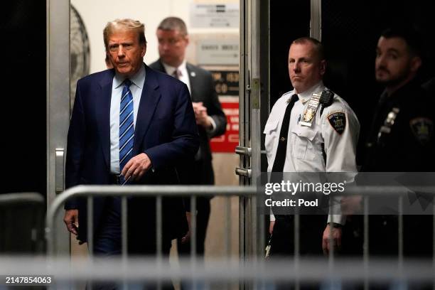Former U.S. President Donald Trump arrives for jury selection on the second day of his trial for allegedly covering up hush money payments at...
