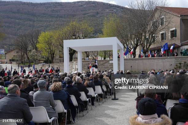 French President Emmanuel Macron delivers his speech during a ceremony at the Martyrologe as part of the commemorations of the 80th anniversary of...