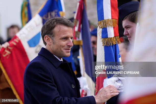 French President Emmanuel Macron attends a ceremony at the Martyrologe as part of the commemorations of the 80th anniversary of the Liberation of...