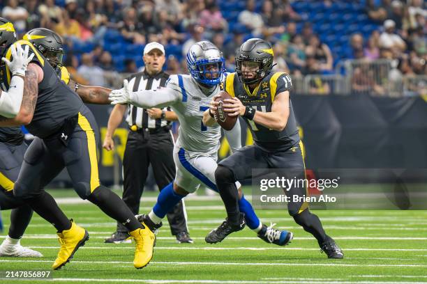Quarterback Chase Garbers of the San Antonio Brahmas scrambles against the St. Louis Battlehawks during the fourth quarter in the game at Alamodome...