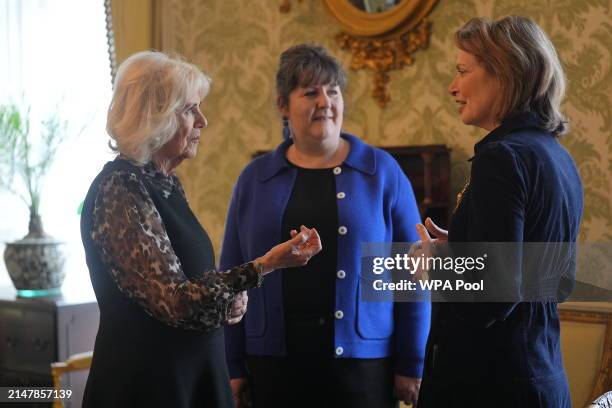 Queen Camilla, Patron of SafeLives, talks with Chief Executive SafeLives Ellen Miller and Chair of Trustees SafeLives Isabel Boyer during a SafeLives...