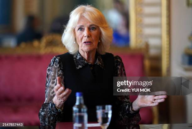 Britain's Queen Camilla, in her role as Patron of the SafeLives charity, meets with young pioneer 'Changemakers', and staff from the SafeLives...