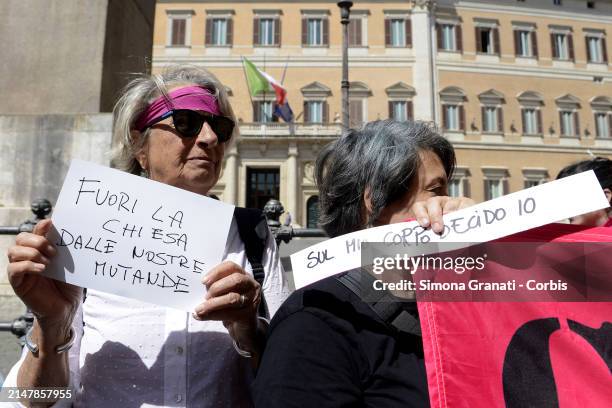 People and various left-wing parliamentarians protest in Piazza di Montecitorio against the legislative measure being voted on today in the Chamber...