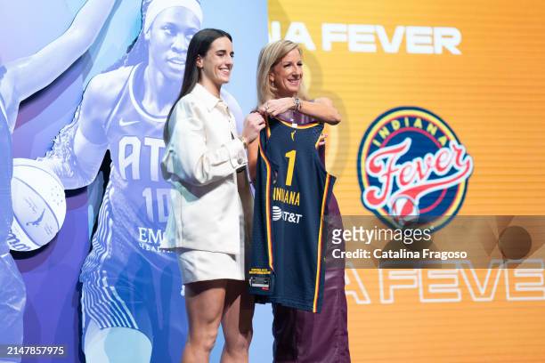 Draftee Caitlin Clark poses for a photo with Cathy Engelbert during the 2024 WNBA Draft on April 14, 2024 at the Brooklyn Academy of Music in...