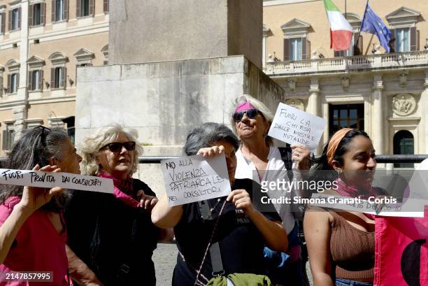 People and various left-wing parliamentarians protest in Piazza di Montecitorio against the legislative measure being voted on today in the Chamber...