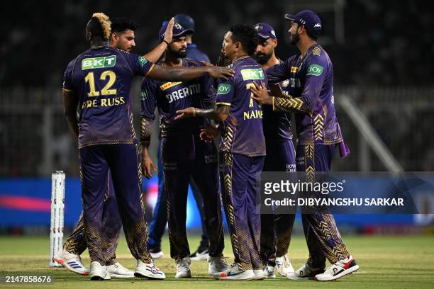 Kolkata Knight Riders' players celebrate after the dismissal of Rajasthan Royals' Dhruv Jurel during the Indian Premier League Twenty20 cricket match...