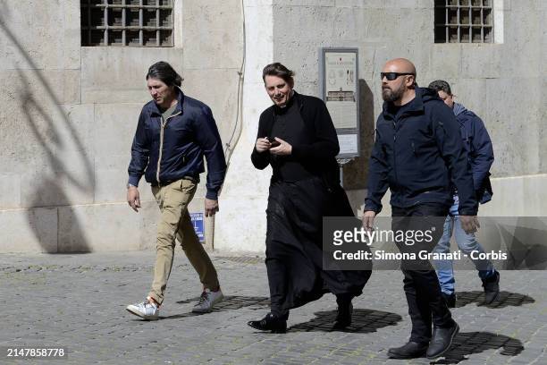 Don Antonio Coluccia walks with his police escort in Piazza Montecitorio ,on April 16, 2024 in Rome, Italy. Don Antonio Coluccia, a courageous...