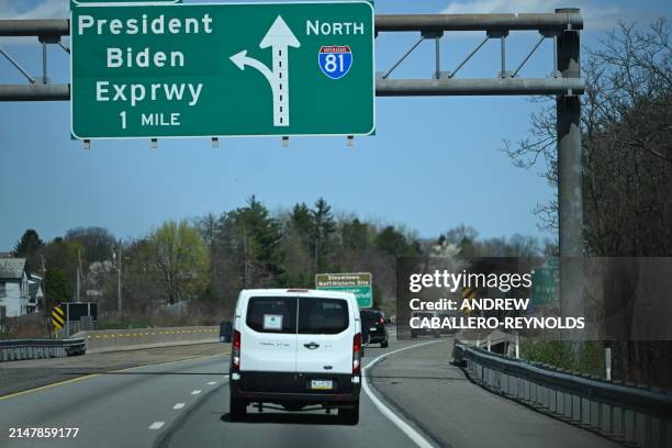 The motorcade of US President Joe Biden travels on Interstate Highway 81, as it heads to President Biden Expressway in Scranton, Pennsylvania, on...