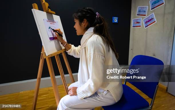 Emma Raducanu of Great Britain designs her dream Porsche on Day Two of the Porsche Tennis Grand Prix Stuttgart 2024 at Porsche Arena on April 16,...