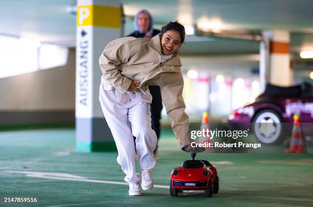 Emma Raducanu of Great Britain does the Posche Driving Challenge on Day Two of the Porsche Tennis Grand Prix Stuttgart 2024 at Porsche Arena on April...