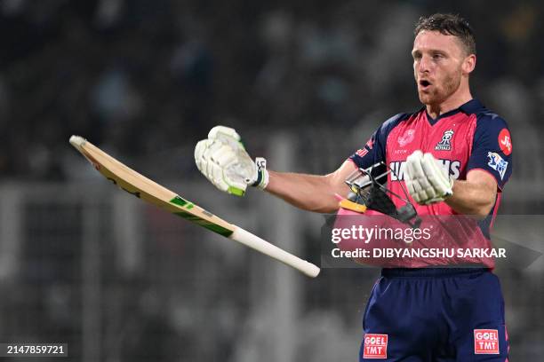 Rajasthan Royals' Jos Buttler celebrates after winning the Indian Premier League Twenty20 cricket match between Kolkata Knight Riders and Rajasthan...