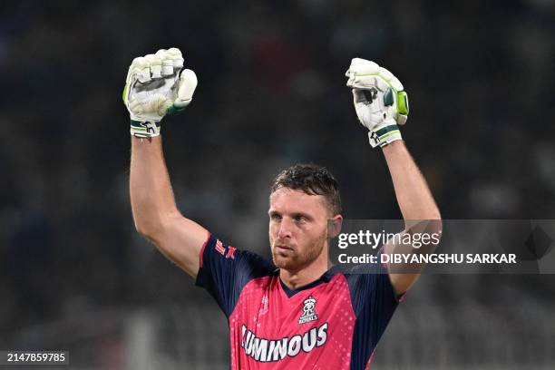 Rajasthan Royals' Jos Buttler celebrates after winning the Indian Premier League Twenty20 cricket match between Kolkata Knight Riders and Rajasthan...