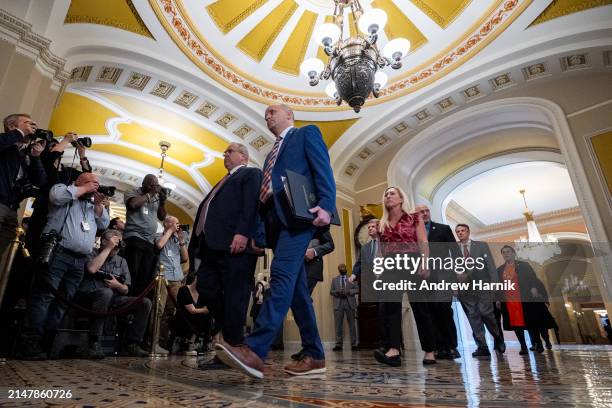 Rep. Marjorie Taylor Greene with the impeachment managers carry the Articles of Impeachment against Homeland Security Secretary Alejandro Mayorkas...