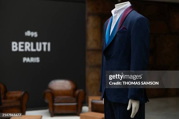 Paris 2024 Olympic and Paralympic Games' team official uniform, is displayed in the showroom of the Berluti Factory in Ferrare, northern Italy on...
