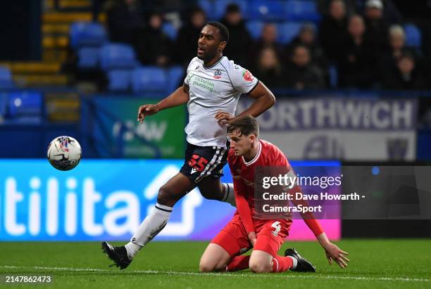 Bolton Wanderers' Cameron Jerome battles with Shrewsbury Town's Joe Anderson during the Sky Bet League One match between Bolton Wanderers and...
