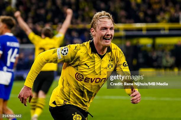 Julian Brandt of Borussia Dortmund celebrates after scoring his team's first goal during the UEFA Champions League quarter-final second leg match...