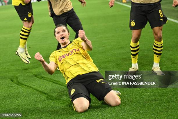 Dortmund's Austrian midfielder Marcel Sabitzer celebrates scoring his team's forth goal 4:2 during the UEFA Champions League quarter-final second leg...