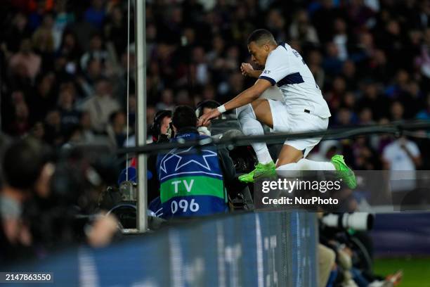 Kylian Mbappe centre-forward of PSG and France celebrates after scoring his sidesImanol Alguacil head coach of Real Sociedad cond goal during the...