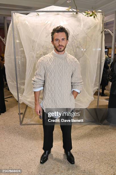 Jonathan Bailey attends the rokh H&M collaboration event at Dover Street Market on April 16, 2024 in London, England.