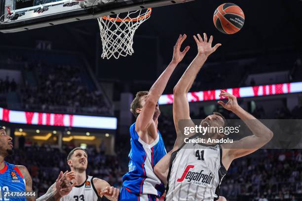 Tibor Pleiss of Anadolu Efes in action against Ante Zizic of Virtus Segafredo Bologna during the Turkish Airlines Euroleague play-in match between...