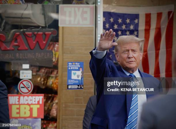 Former US President Donald Trump visits a Sanaa convenient store in a Harlem neighborhood after spending his second day of his trial for allegedly...