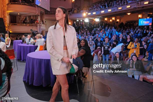 Caitlin Clark looks on after being drafted first overall by the Indiana Fever during the 2024 WNBA Draft on April 15, 2024 at the Brooklyn Academy of...