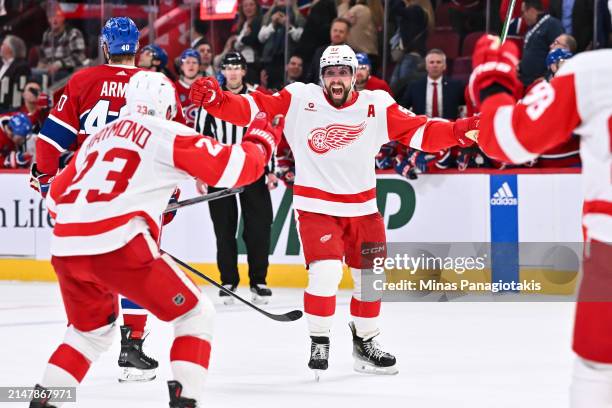 David Perron of the Detroit Red Wings reacts after scoring a goal to tie the game late in the third period against the Montreal Canadiens at the Bell...