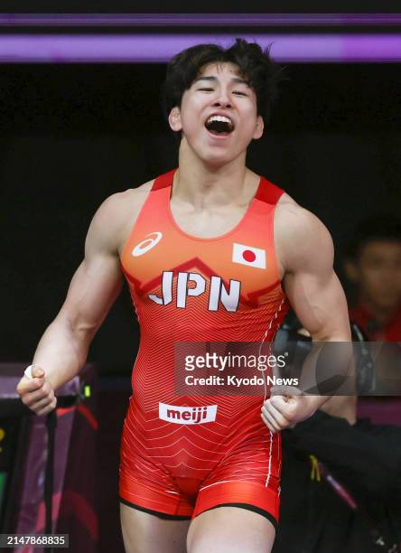 Shingo Harada of Japan celebrates after winning the men's Greco-Roman 72-kilogram title at the Asian wrestling championships in Bishkek, Kyrgyzstan,...