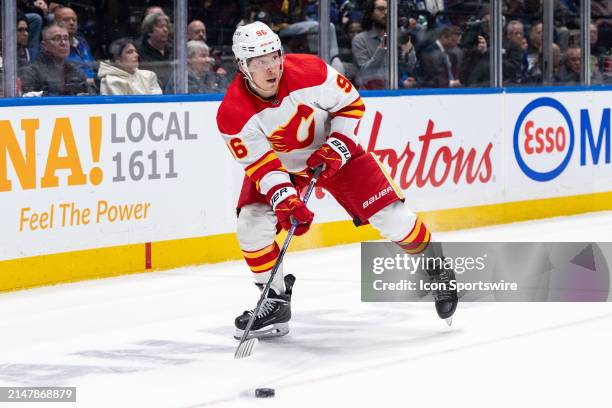 Calgary Flames left wing Andrei Kuzmenko skates with the puck during an NHL game between the Calgary Flames and the Vancouver Canucks on, Tuesday,...