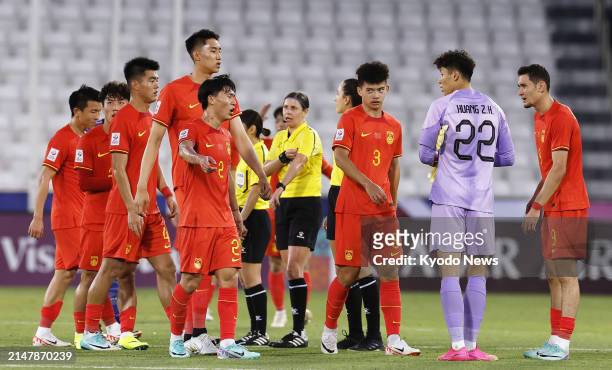 China players are pictured after losing to Japan in an under-23 Asian Cup men's football group-stage match in Doha on April 16, 2024.