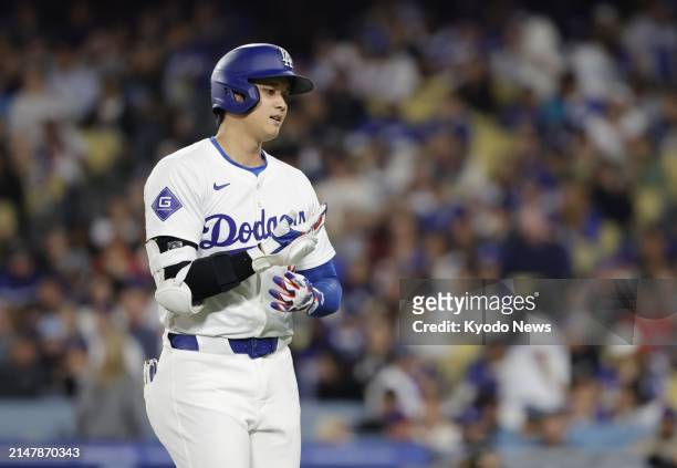 Shohei Ohtani of the Los Angeles Dodgers is pictured after grounding out in the fourth inning of a baseball game against the Washington Nationals at...