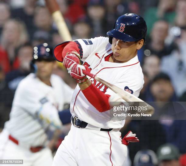 Boston Red Sox designated hitter Masataka Yoshida bats against the Cleveland Guardians during the first inning at Fenway Park in Boston on April 16,...