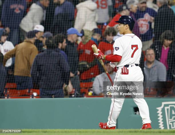 Boston Red Sox designated hitter Masataka Yoshida walks off the field after striking out in the eleventh inning of a baseball game against the...