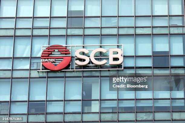 Signage atop a Saigon Commercial Bank branch in Ho Chi Minh City, Vietnam, on Wednesday, April 17, 2024. Vietnam has mounted a rescue of a bank tied...