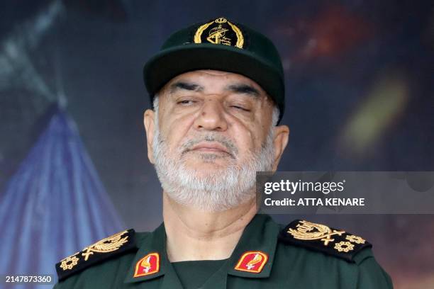 The head of Iran's Islamic Revolutionary Guard Corps, Hossein Salami, attends a military parade as part of a ceremony marking the country's annual...