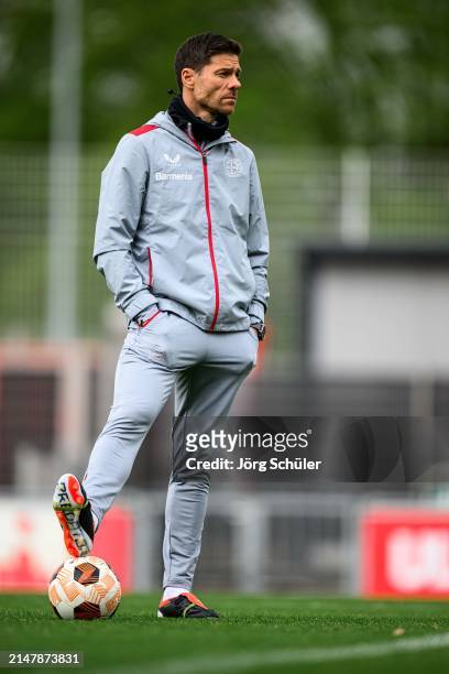 Headcoach Xabi Alonso of Leverkusen looks on ahead of their UEFA Europa League 2023/24 Quarter-Final second leg match against West Ham United FC at...
